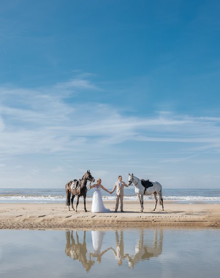 Bride and Groom during the ceremony on the beach, a true bohemian dream setting